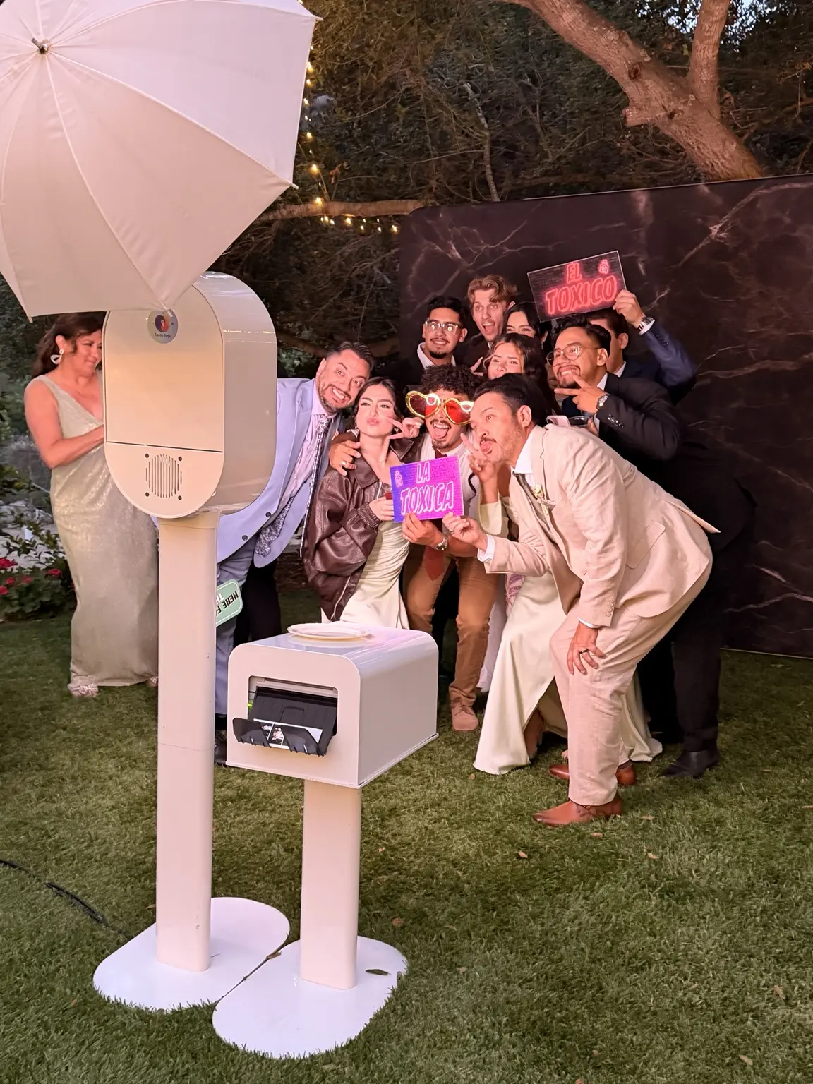Wedding guests celebrating together at Fiesta Booth
