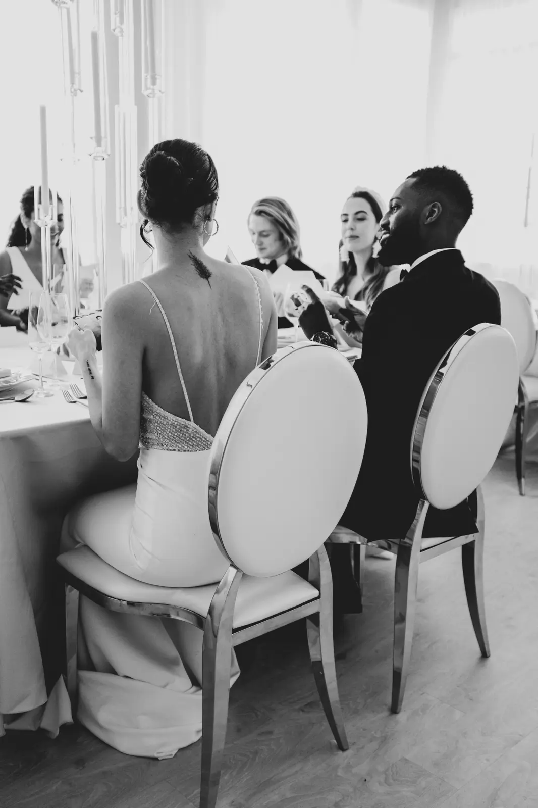 Black and white candid of guests at an event